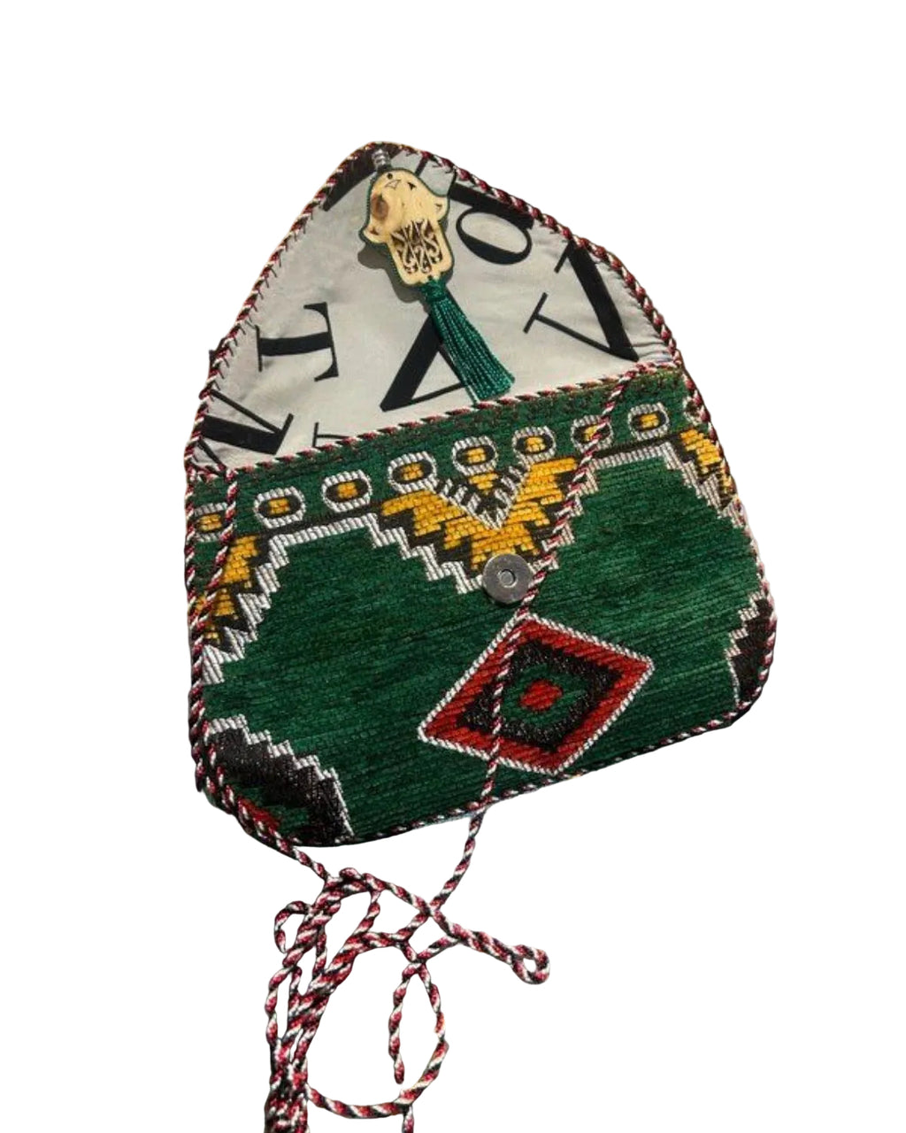 Pochette kilim berbère vert émeraude motifs géométriques — artisanat marocain fait main