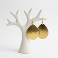Boucles d'oreilles goutte dorée martelée