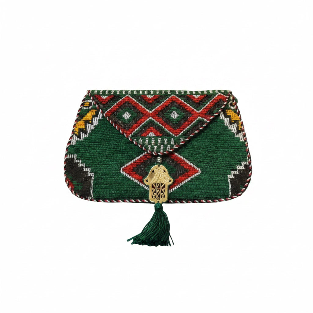 Pochette kilim berbère vert émeraude motifs géométriques — artisanat marocain fait main