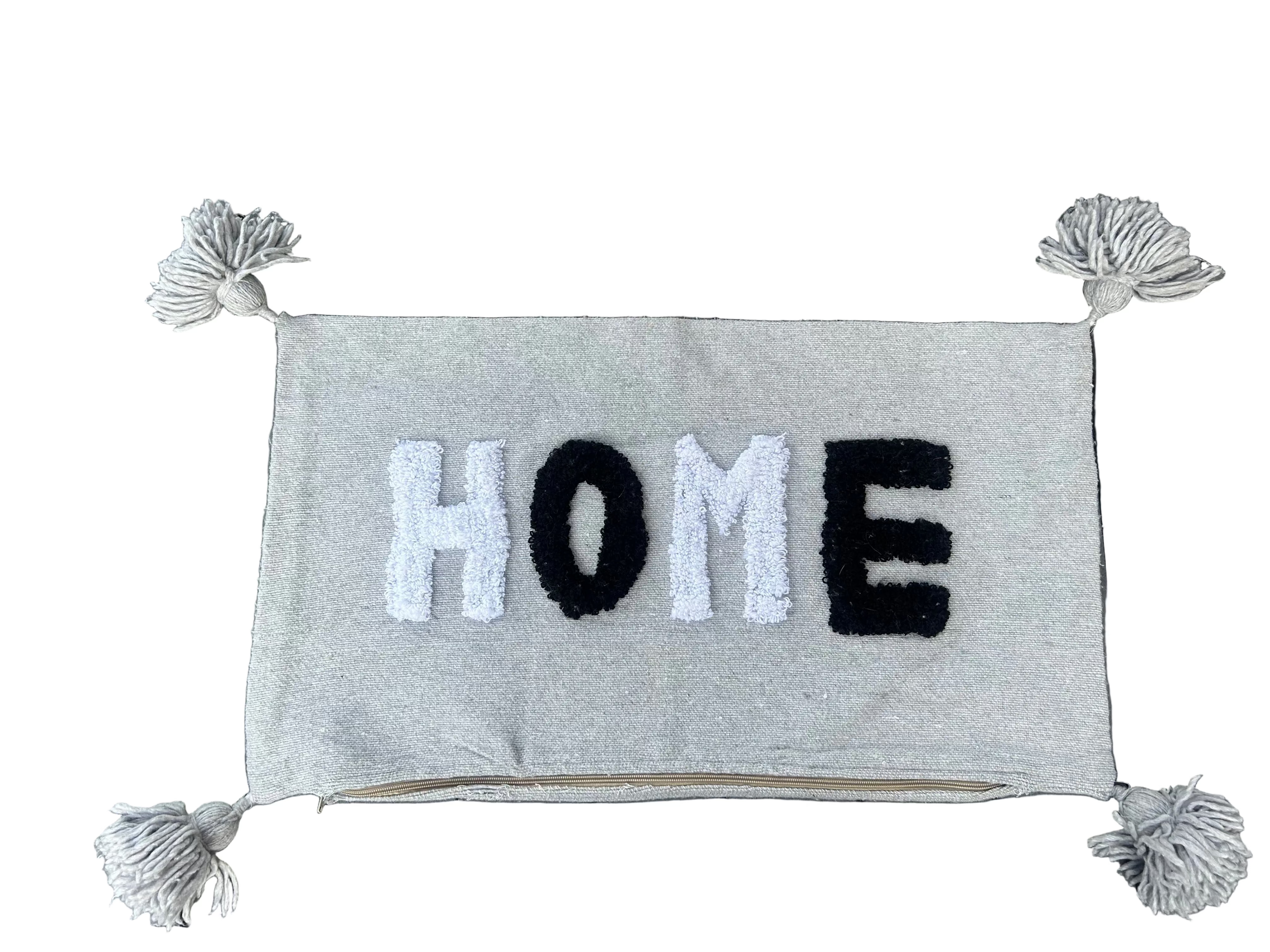 Housse de coussin HOME brodée à la main gris et noir — pompons berbères artisanat marocain
