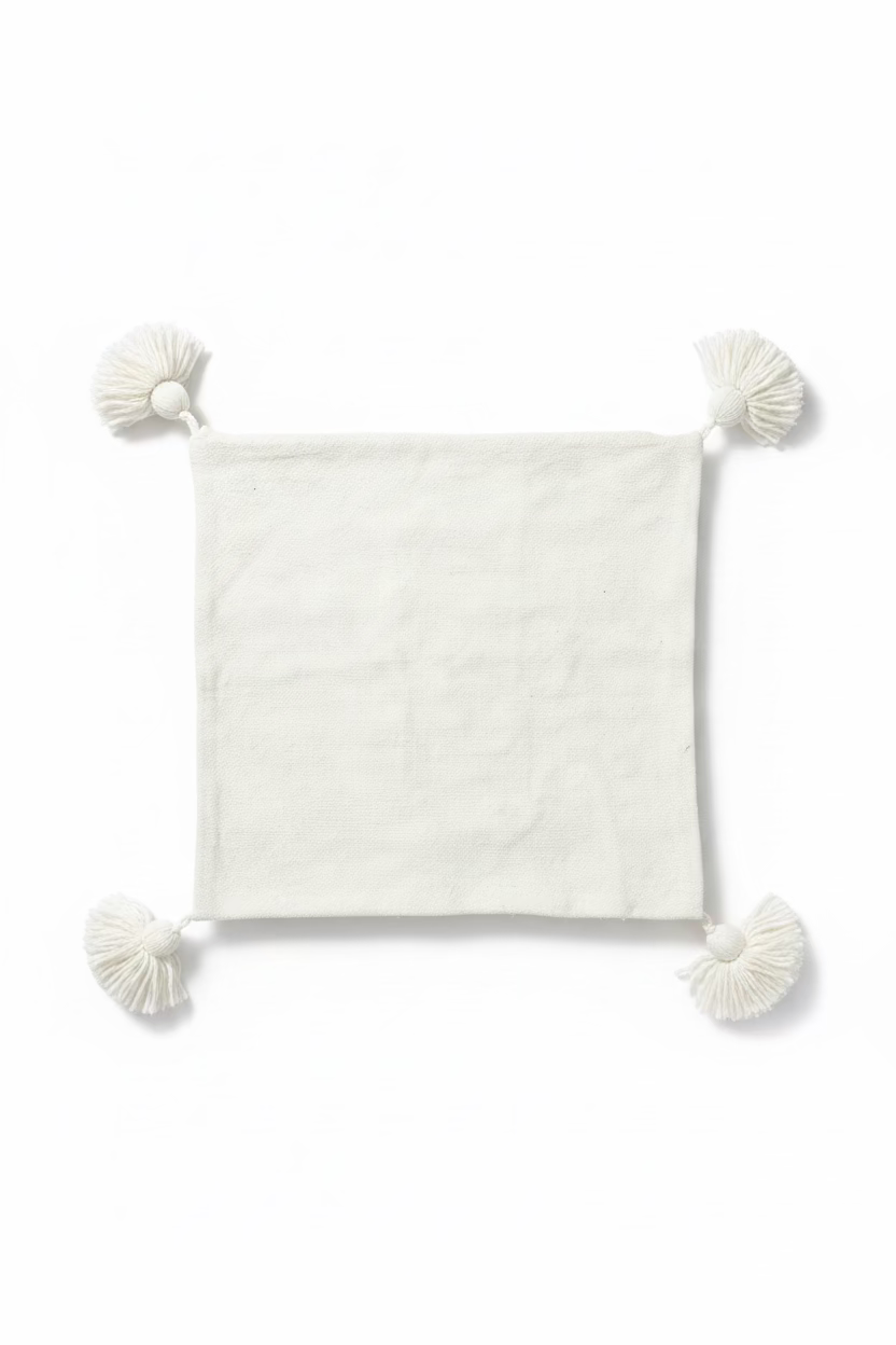 Housse de coussin visage de profil one line brodé ivoire et noir — pompons artisanat marocain fait main