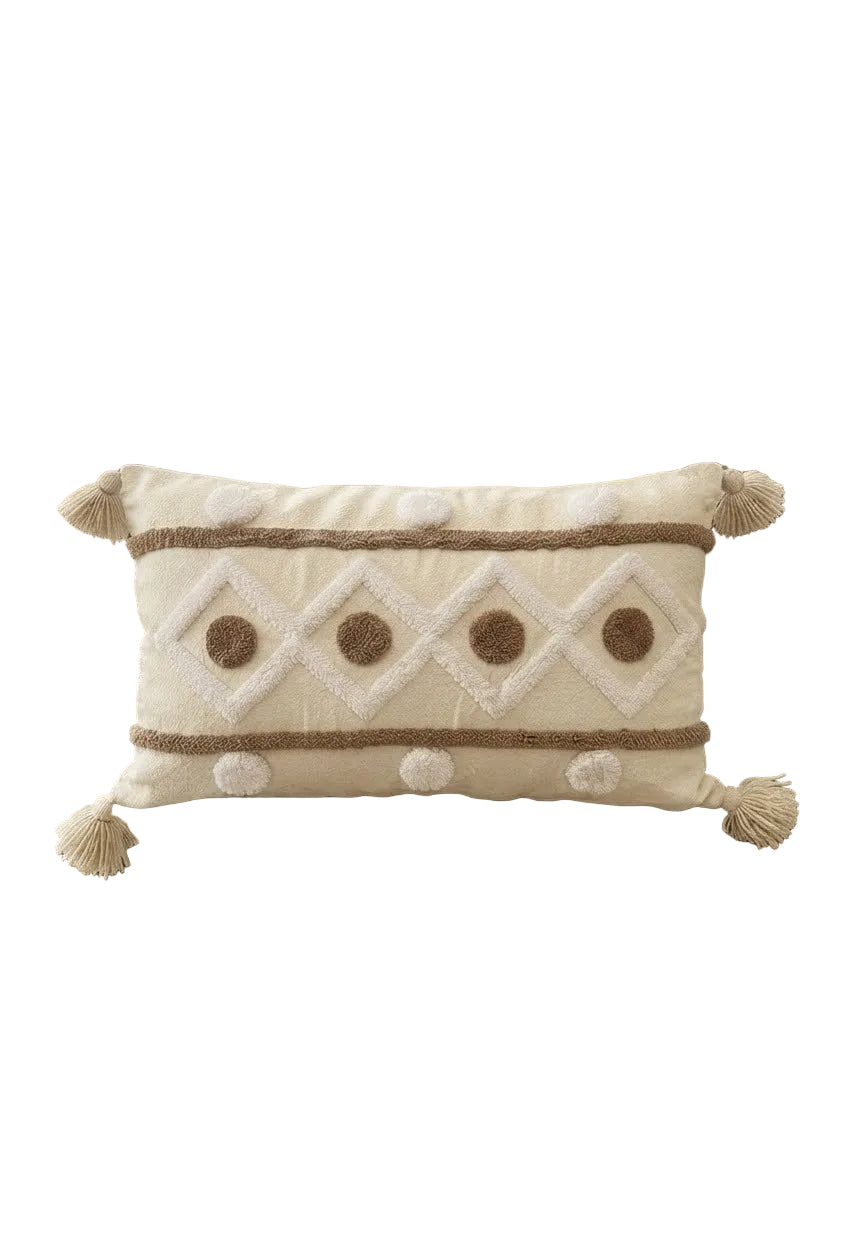 Coussin lombaire écru fait main, motifs losanges tufté blanc et médaillons caramel, pompons aux quatre coins, artisanat marocain
