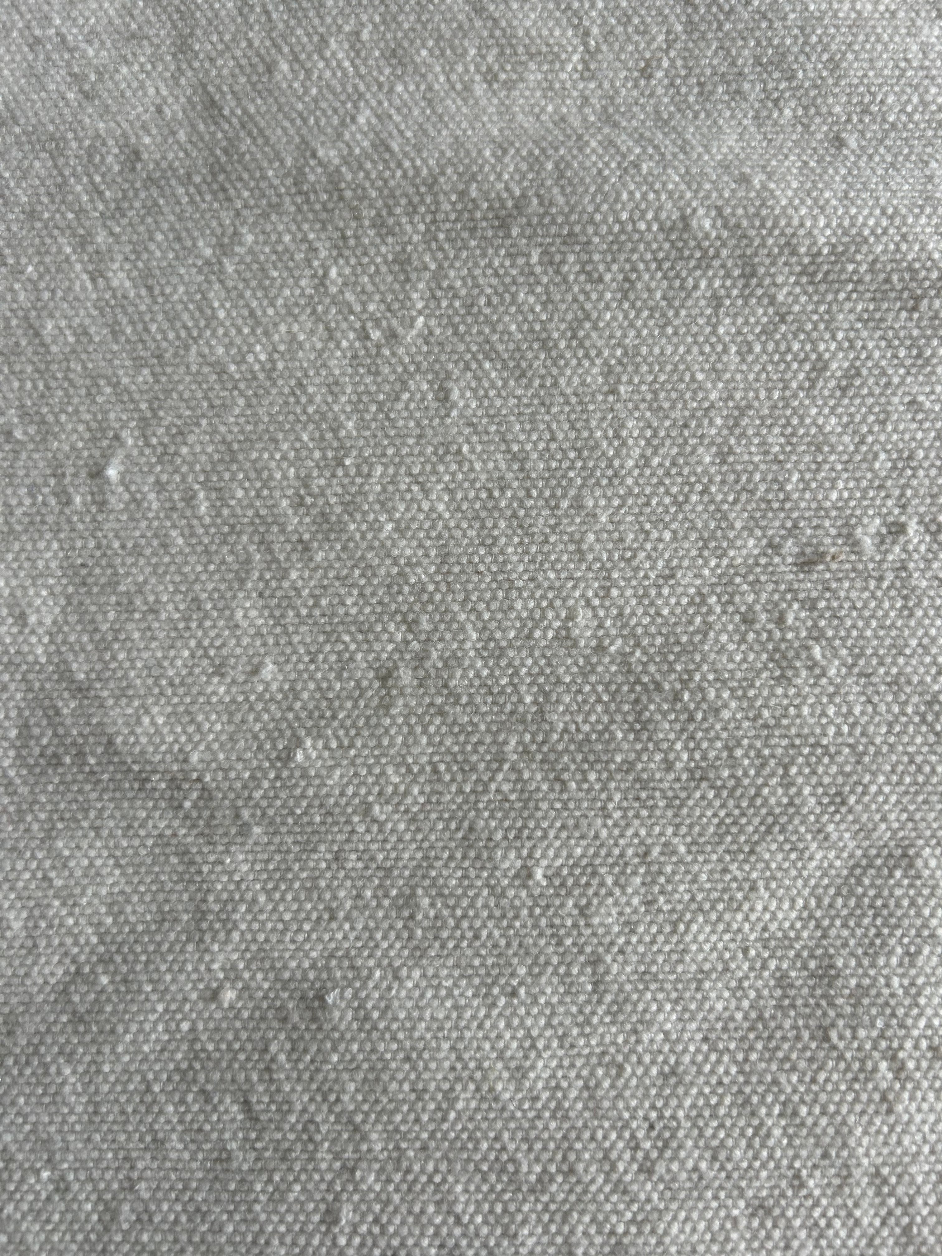 Gros plan texture coton naturel tissé à la main – Matière douce et légèrement gaufrée, housse de coussin éc